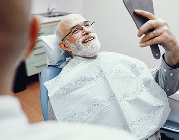 Older man seeing a dentist for a checkup